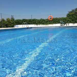 Limpieza a fondo de piscina.