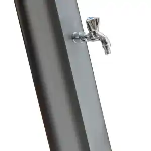 dsps35-1 | PisciManía Chrome faucet protruding from a gray metal panel, ready to dispense liquid.