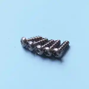 wr000501-2 | PisciManía Six silver Phillips-head screws lined up on a blue background (close-up).