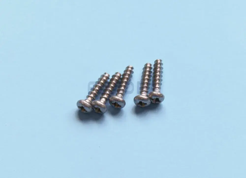wr000501-3 | PisciManía Six small silver Phillips-head screws on a light blue background.